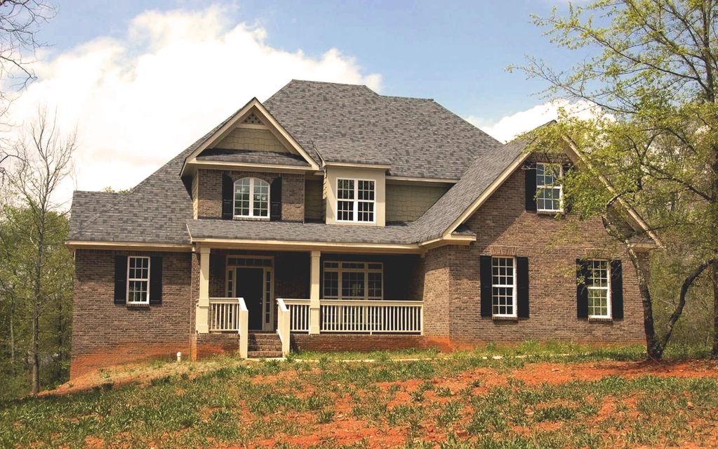 Residential roof replacement featuring designer architectural shingles in Monroe, GA