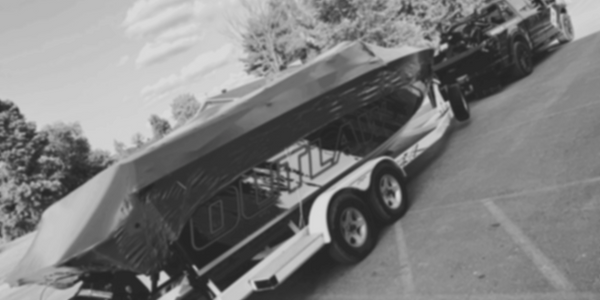 Boat carrier attached to car