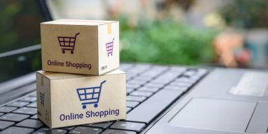 Small boxes labeled 'Online Shopping' on a laptop keyboard.