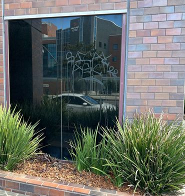 Acid Etched Graffiti, Scratched Glass and Window Repair and Removal.