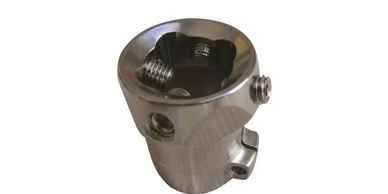 Close-up of a shiny metallic mechanical part with screws.