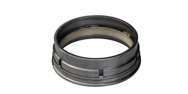 A black metal industrial ring with a grooved design.