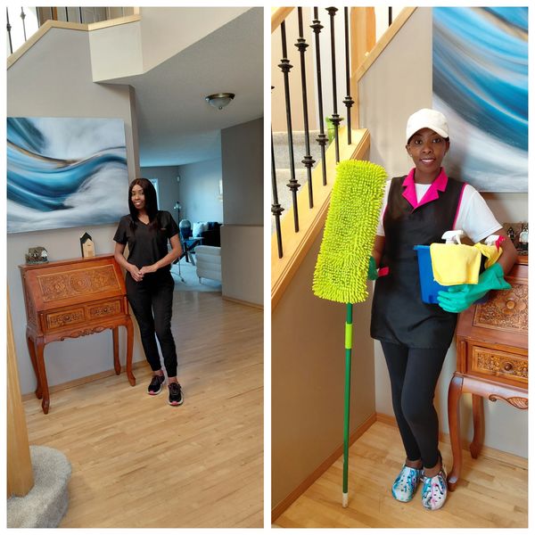 Two women standing indoors, one in casual wear and the other in cleaning attire holding supplies.