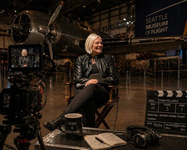 Woman being interviewed at Seattle Museum of Flight.