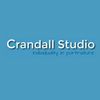 Logo of Crandall Studio with tagline on blue background.