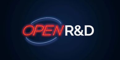 Neon sign saying OPEN R&amp;D