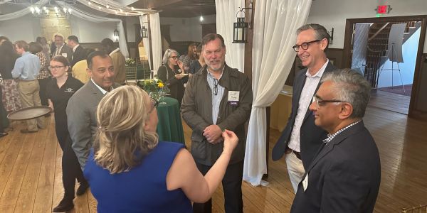 Group at a lively indoor networking event.