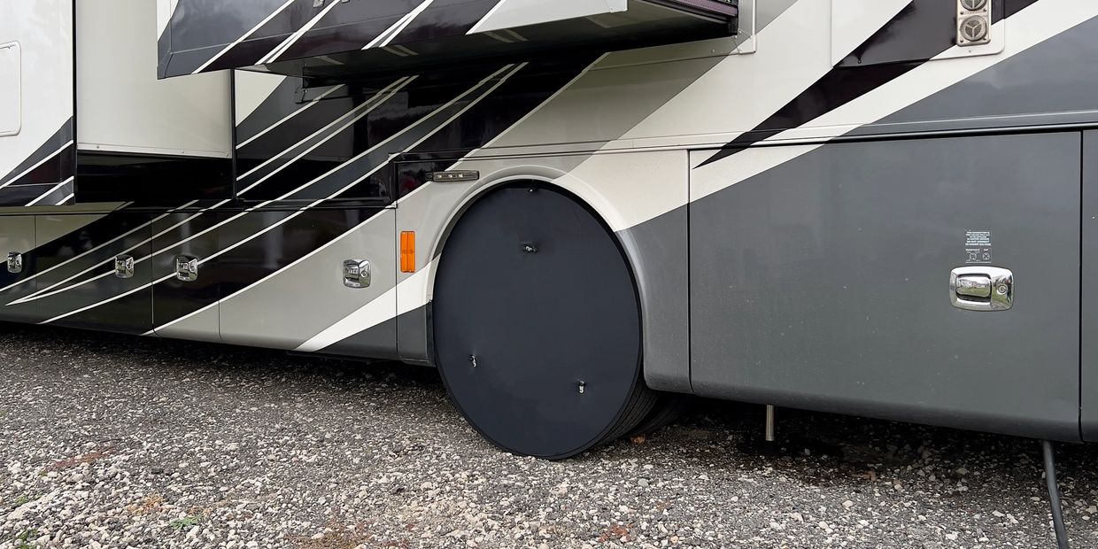 Parked Class A Motorhome showing 42' Superb Tire Shield
