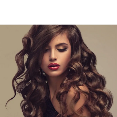 Woman with voluminous, curly brunette hair and bold makeup.