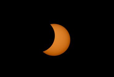 Partial solar eclipse in progress.