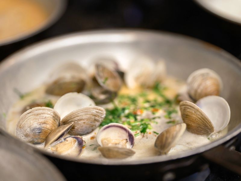 Fresh clams served in a white wine sauce at Alfredo's Pastaria and Mozzarella Bar.