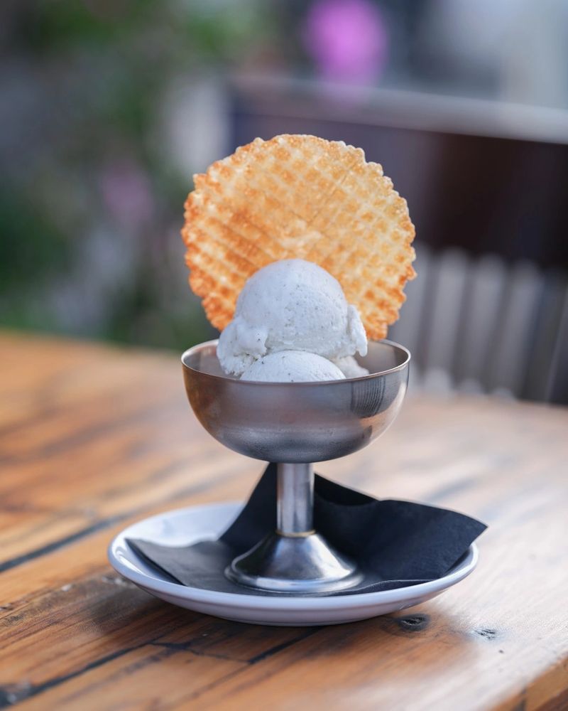 A freshly served ice cream dish.