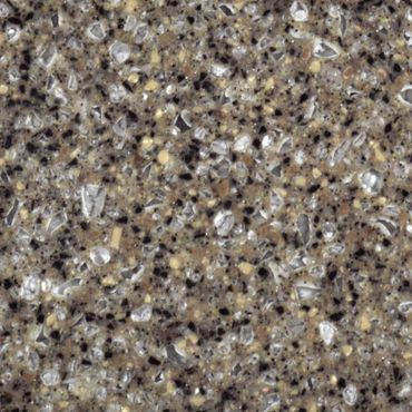 Close-up of a terrazzo surface with mixed stone chips.