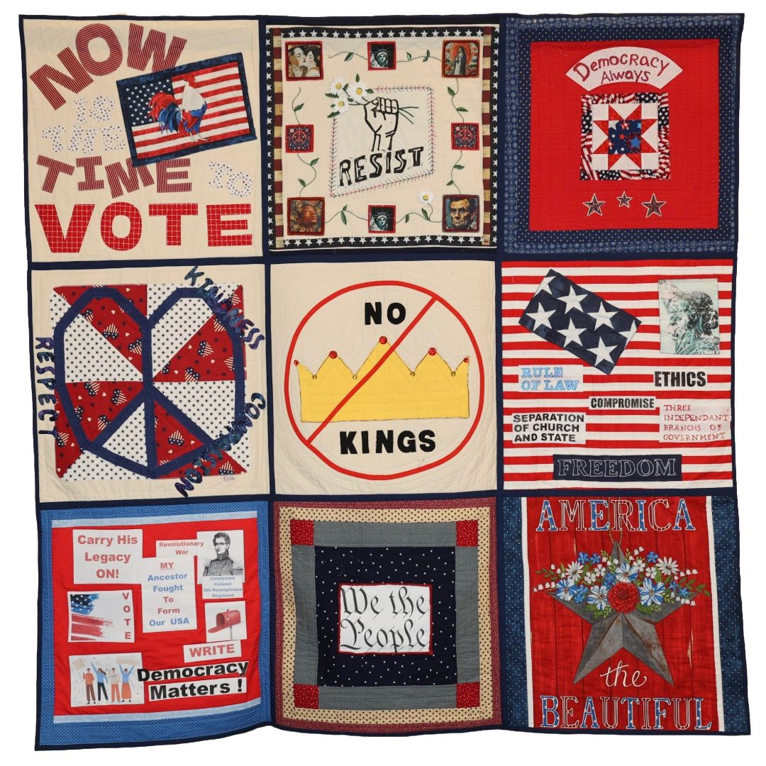Quilt with patriotic and democratic messages promoting voting and freedom.