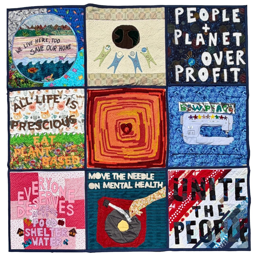 A quilt with nine panels promoting environmental and social justice messages.