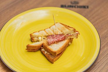 Delicious salami and cheese toast to start your day.