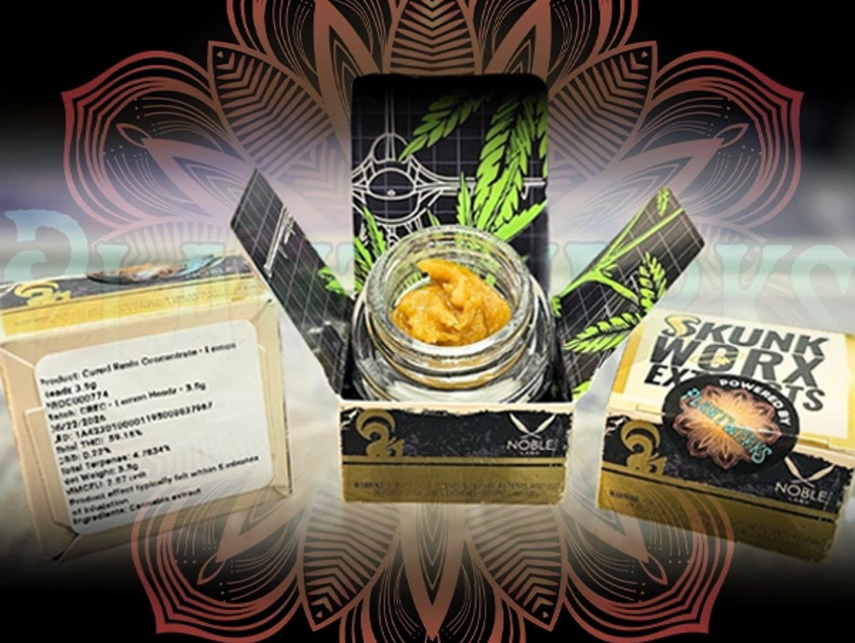 Cannabis concentrate jar with packaging.