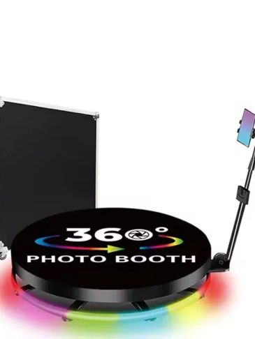 360-degree photo booth platform with colorful LED lights and phone holder.