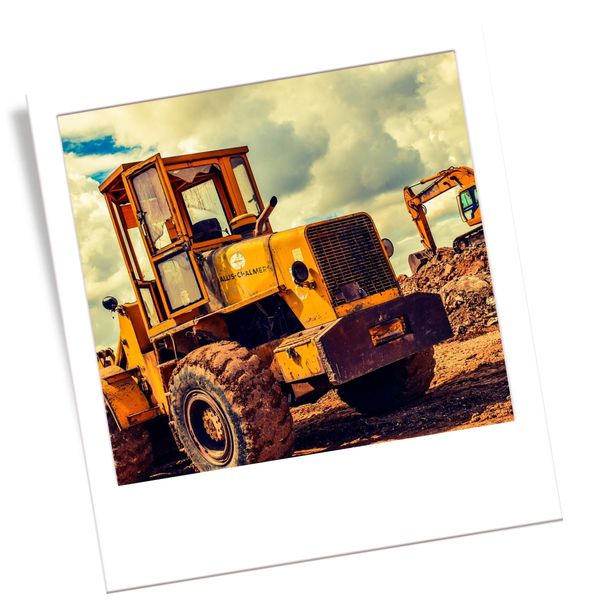 heavy construction machinery showing a construction site and renovation work being done