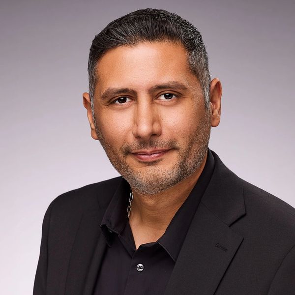 Professional headshot of Armin Mousavi, a Persian realtor based in Los Angeles.
