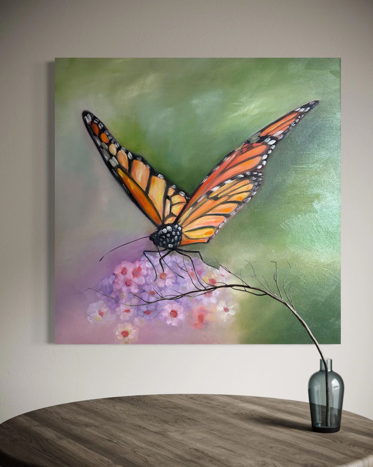 Painting of a monarch butterfly on purple flowers with a green background.