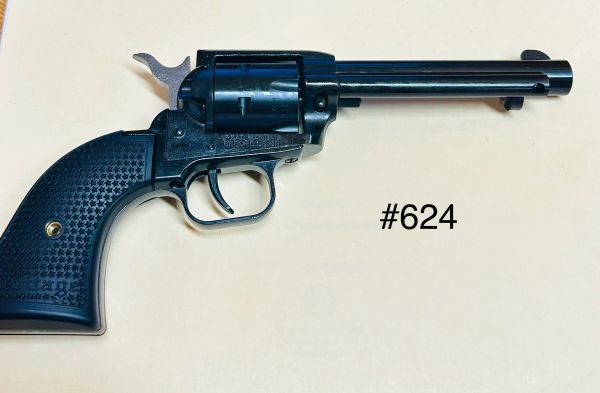 A black revolver gun with a textured grip and a long barrel, labeled #624.