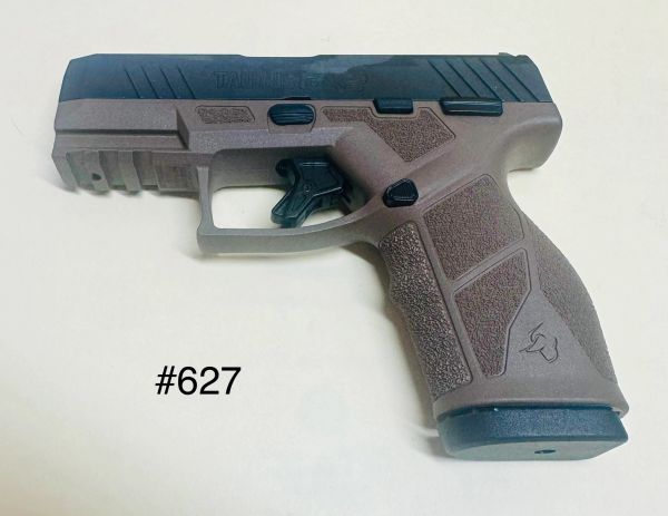 Brown and black semi-automatic pistol with textured grip labeled #627.