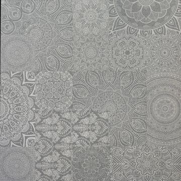 Intricate mandala patterns in monochrome grey tones.