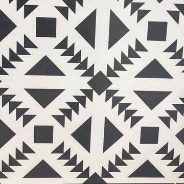Black geometric shapes forming a symmetrical pattern on a white background.
