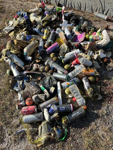 Empty paint spray cans 