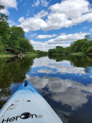 Kayak trip down the Grand River on a blue sky day