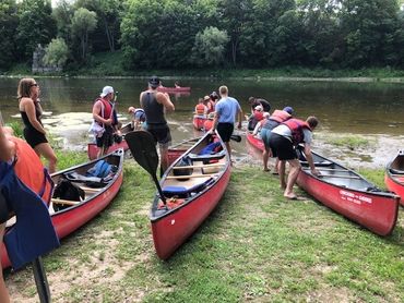 A canoeing group event ready to launch