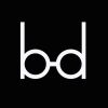 Minimalist black and white logo with letters 'b' and 'd'.