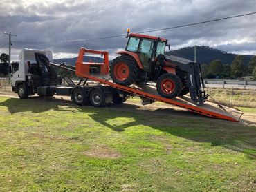 Farm equipment tractor towing. Jonno's Towing Tasmania