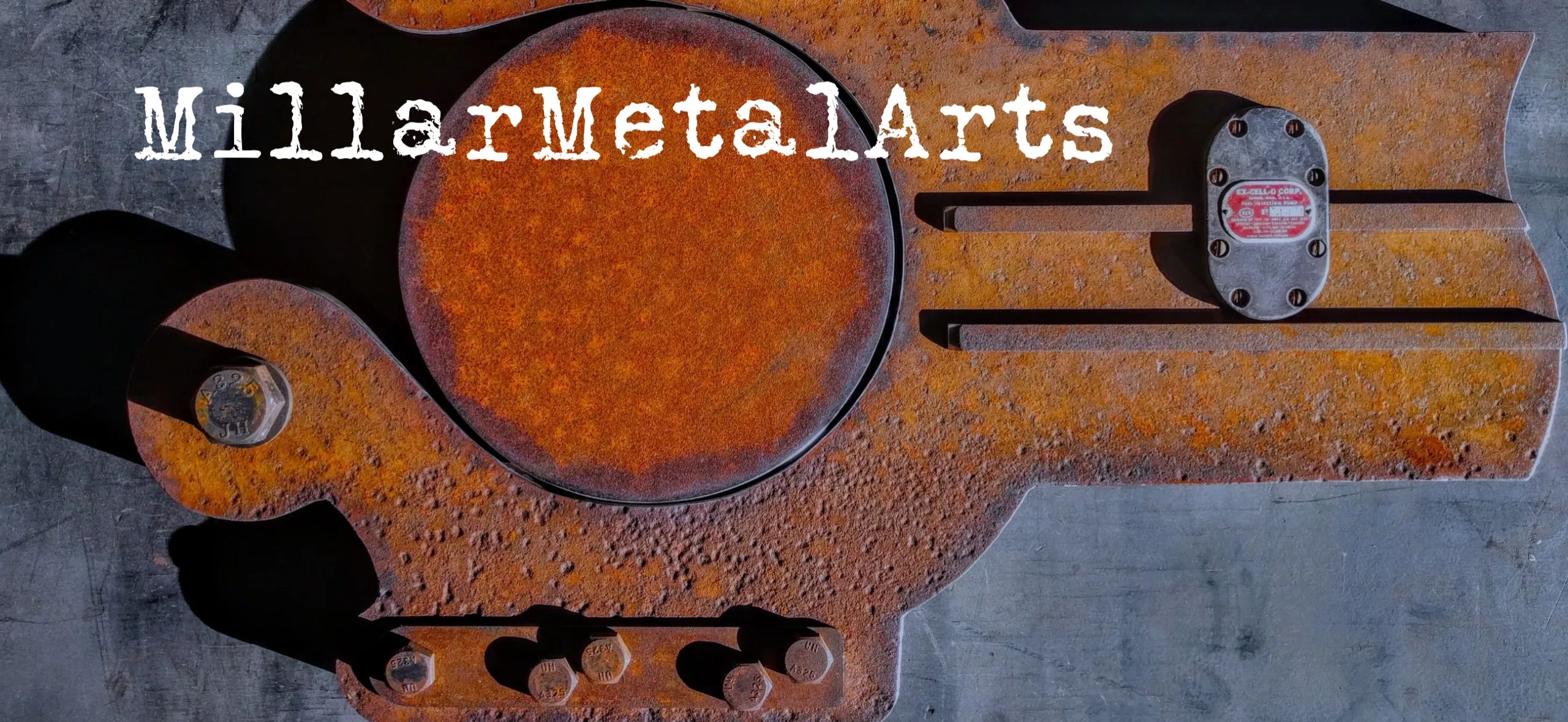 rusty metal art sculpture with upcycled recycled steel and industrial tooling and machine parts