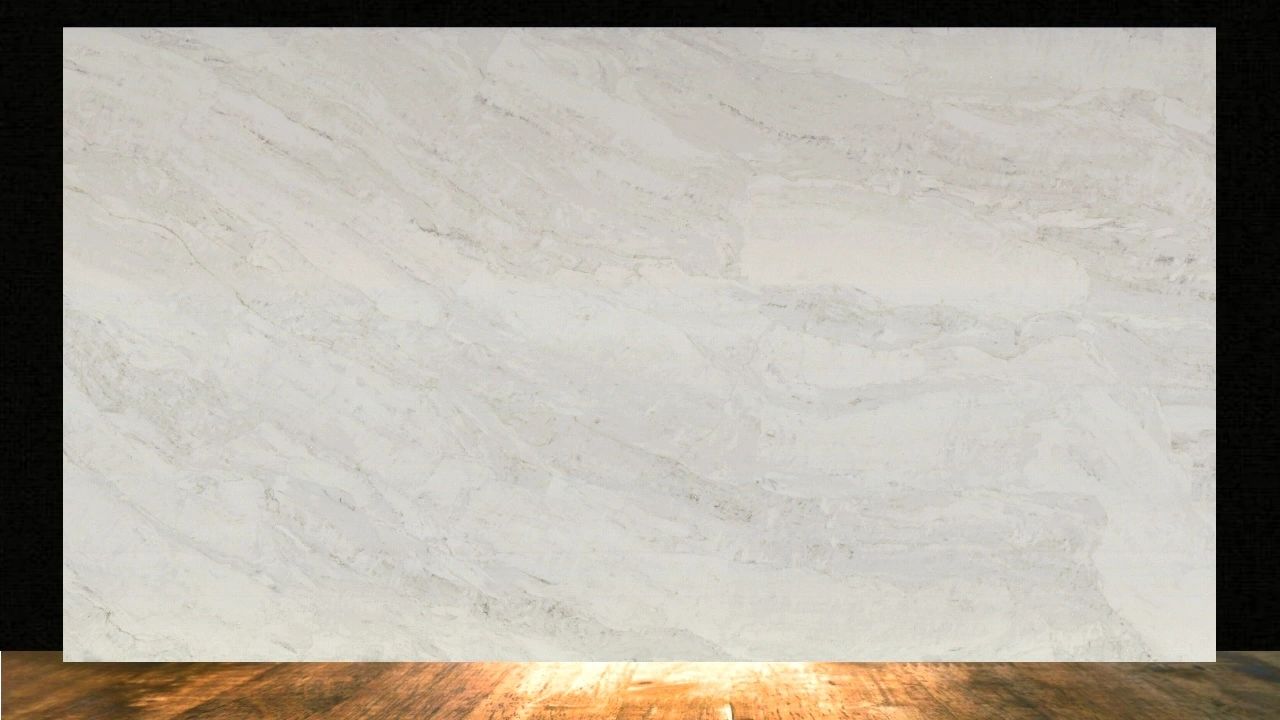Light marble slab with subtle gray veins against a dark background on wooden floor.