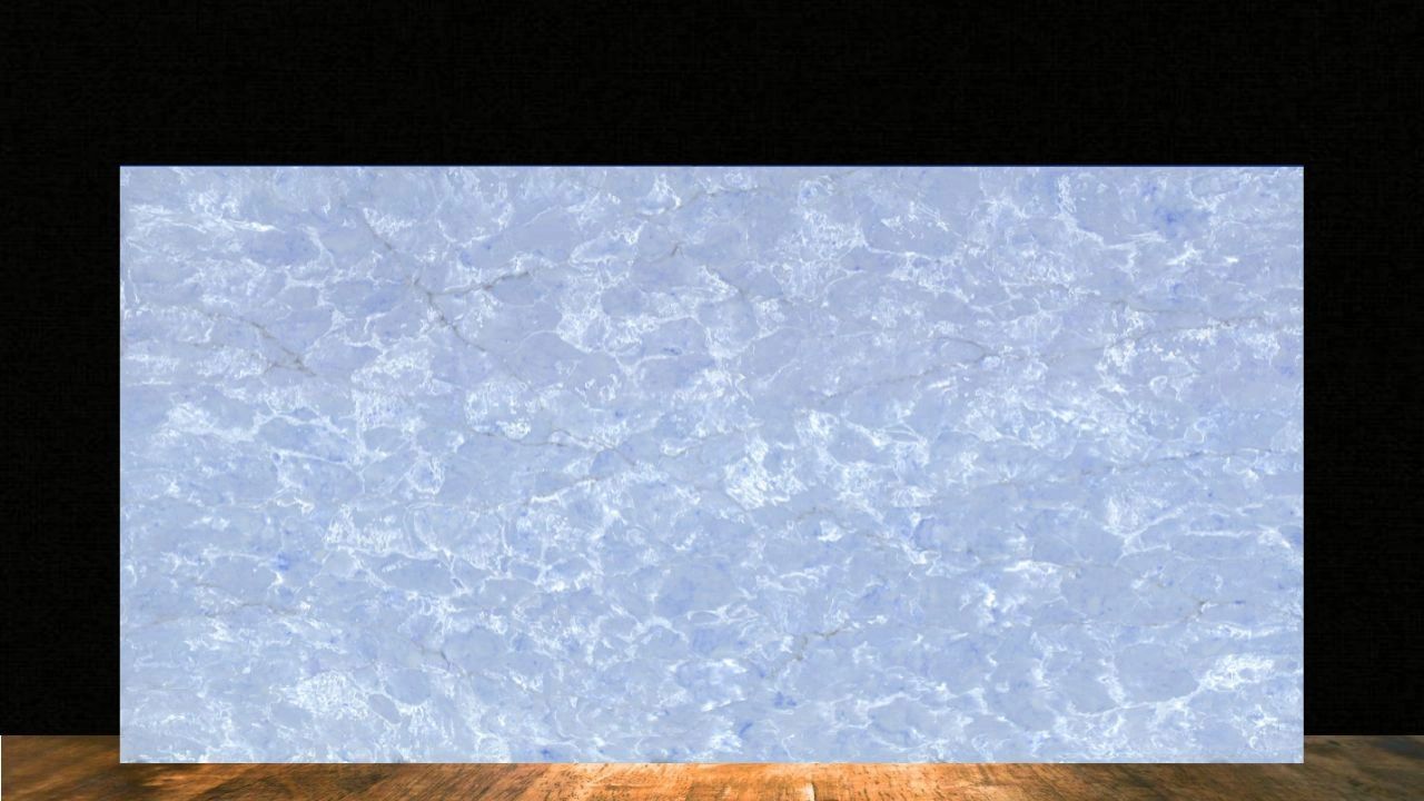 A blue marble slab displayed on a wooden surface against a black background.