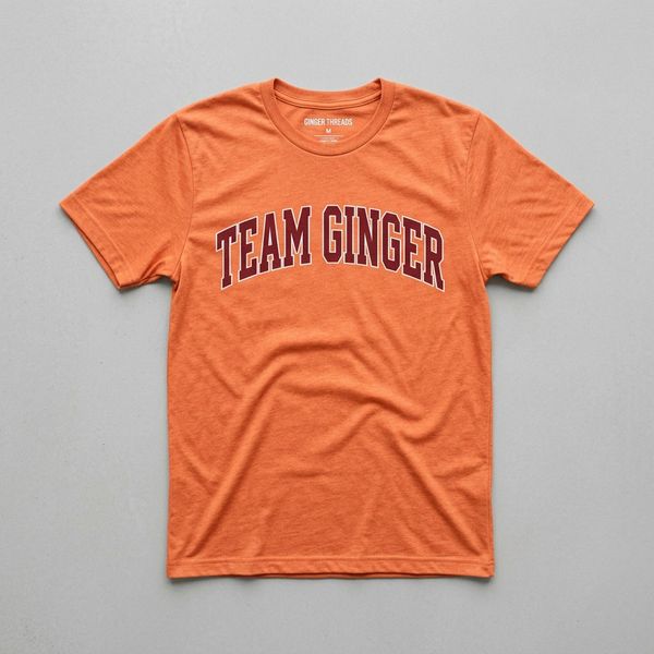 Orange T-shirt with TEAM GINGER text.