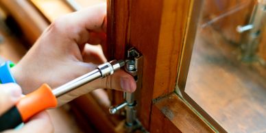 Emergency Locksmiths in Bingley fixing uPVC window lock