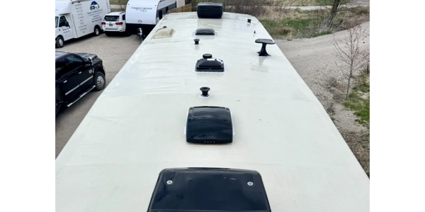 Mobile RV roof inspection cleaning and resealing service on 5wh camper in Des Moines Central Iowa