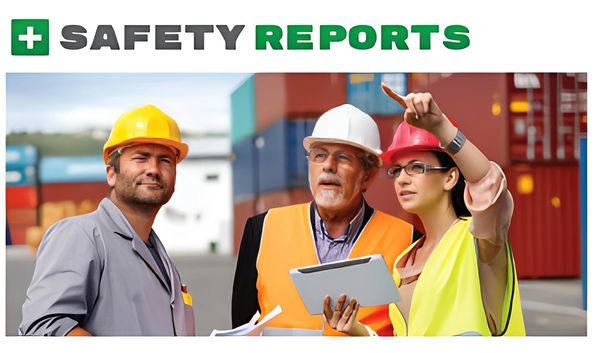 Two construction workers, one female, wearing hard hats and safety vests, smiling.

