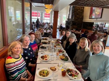Group of women dining together at a restaurant.