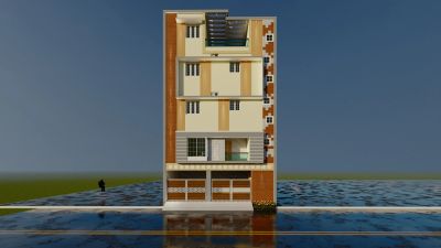 Tall multi-story building by the waterfront.