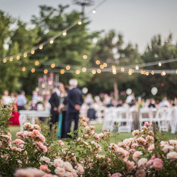 An event with decorative flowers and lights