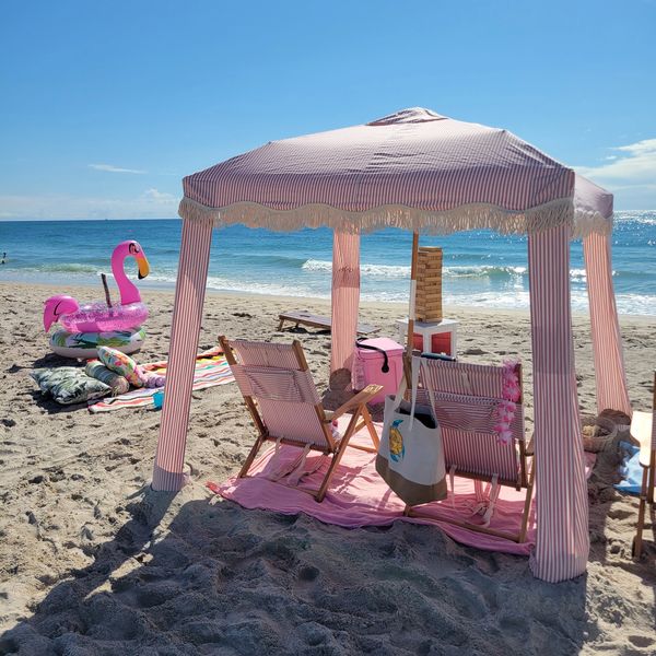 Single Cabana Rental in South Florida with floats beach chairs, beach bag.