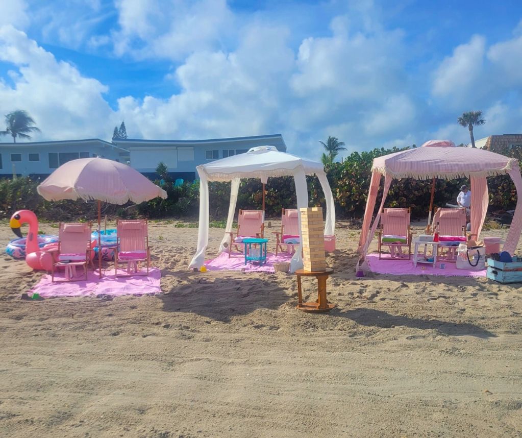 Beach chair on beach for bachelorette party ideas in Deerfield. Cabana rental with yeti coolers.