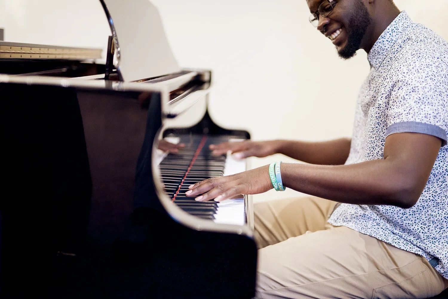 Young, African-American man enjoys private piano lessons near St Louis