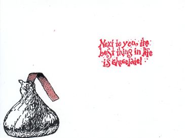 A Hershey's Kiss chocolate with a note saying it's the best thing in life after you.