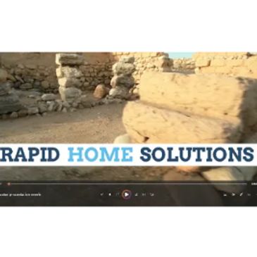 Ruins with the text 'Rapid Home Solutions'.