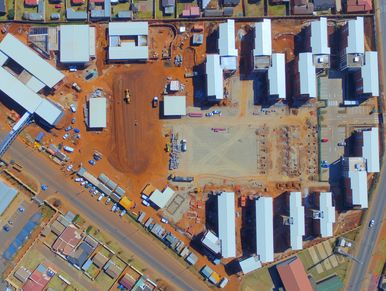 High Density Residential Development with School Gym and Multi Story Buildings